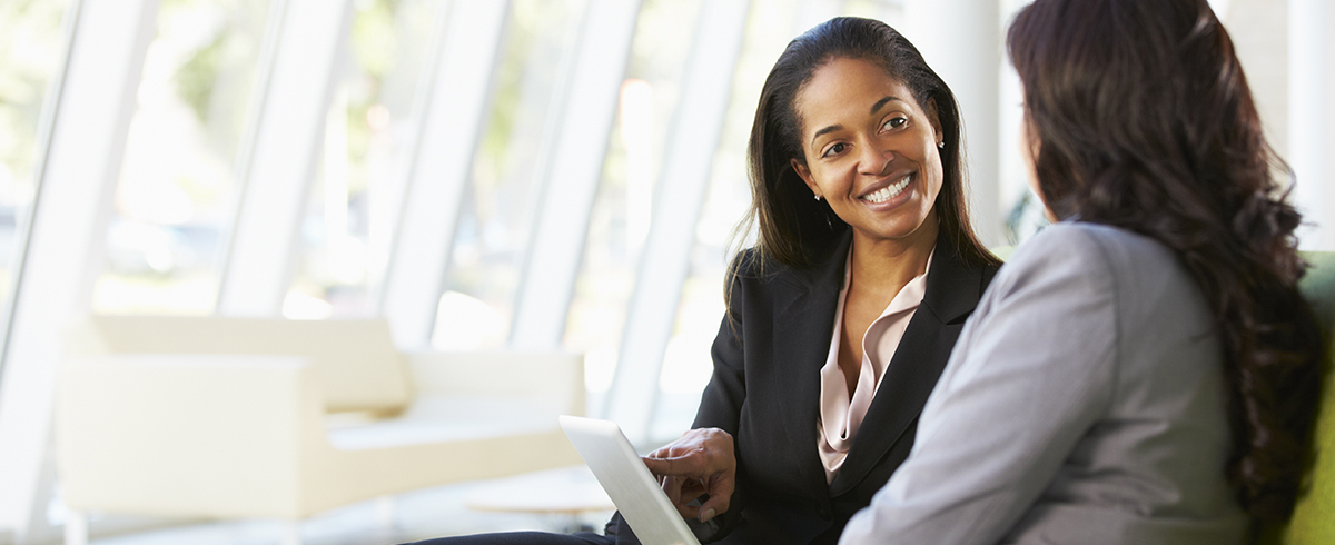 businesswoman talking to client